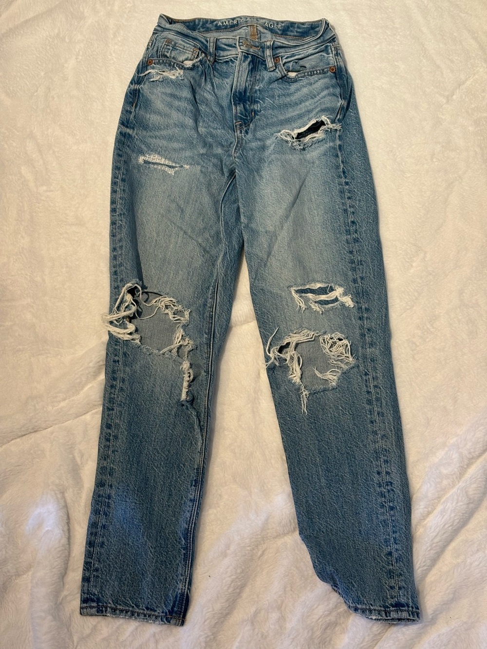 Women’s Distressed Blue Denim Jeans -